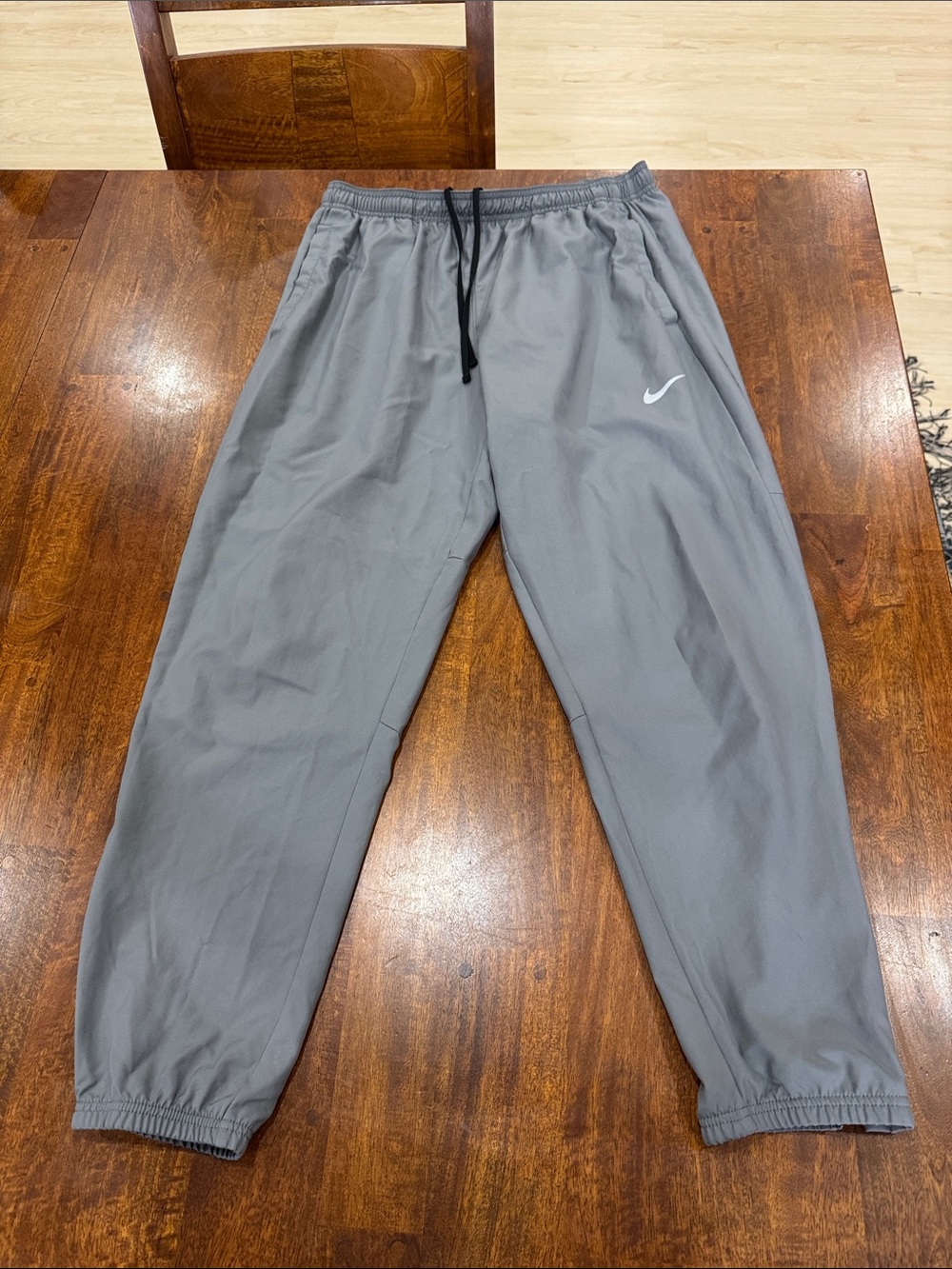 Nike Men’s Gray Jogger Sweatpants with Swoosh on Left Leg